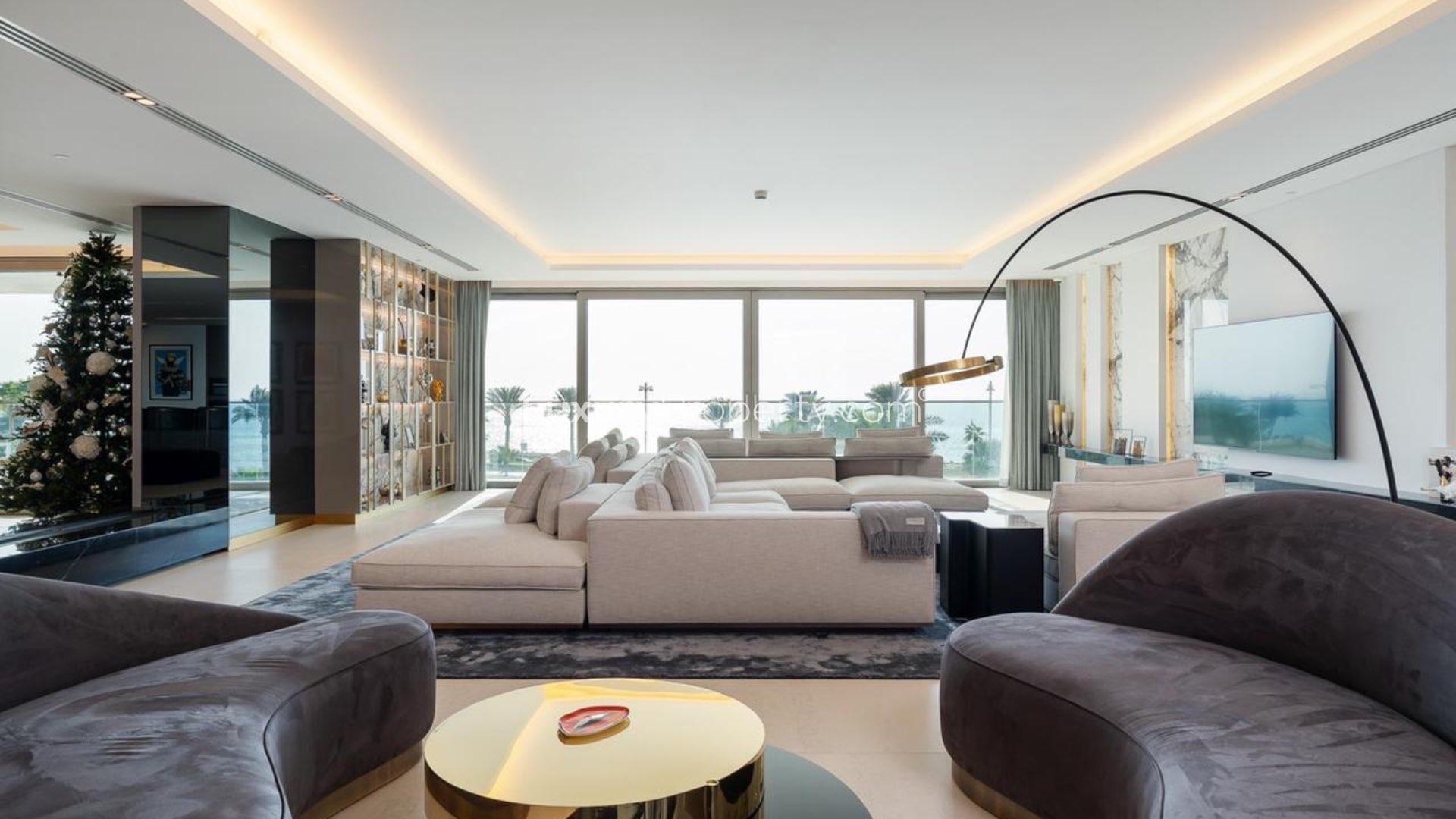 Luxurious W Residence apartment hallway with modern decor and striking red sculpture