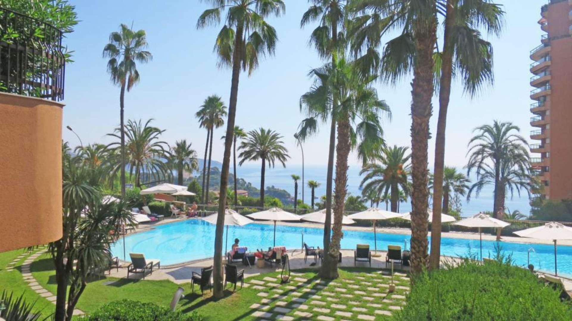 Luxurious dining area in 2-bedroom apartment, Parc Saint Roman, Monaco, with modern decor