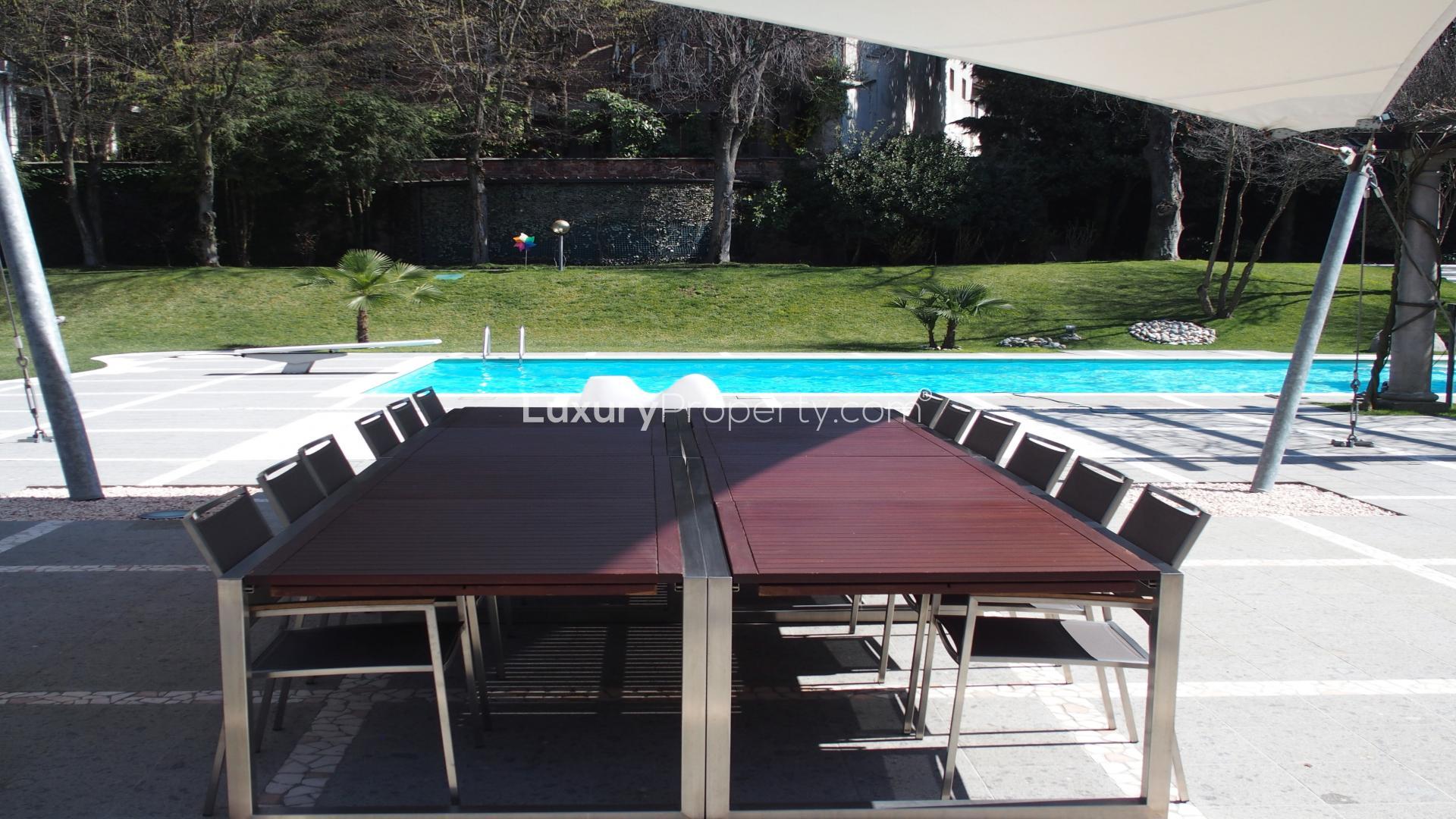 Exterior view of Art Nouveau villa with columns in Vigevano, near Milan, for sale