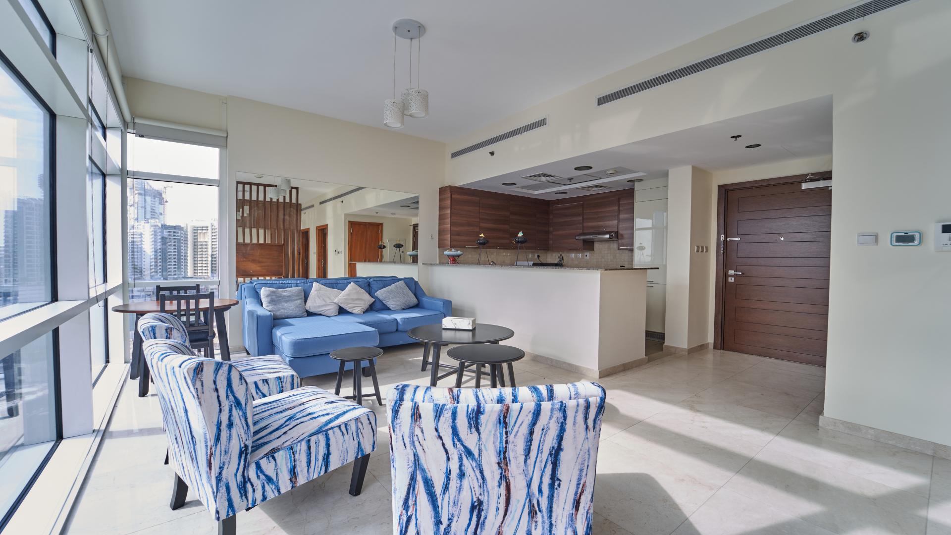 Furnished studio apartment in Bay Square, Business Bay with modern living room and large windows