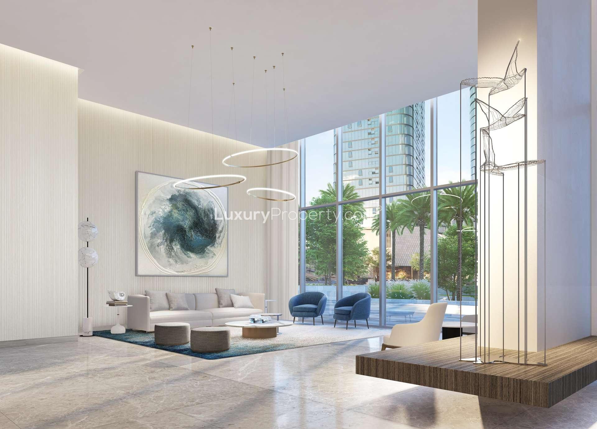 "Modern living room in Emaar Beachfront apartment, Dubai Harbour, stylish decor and large windows.",Luxurious lobby interior of one-bedroom apartment in Emaar Beachfront, Dubai Harbour