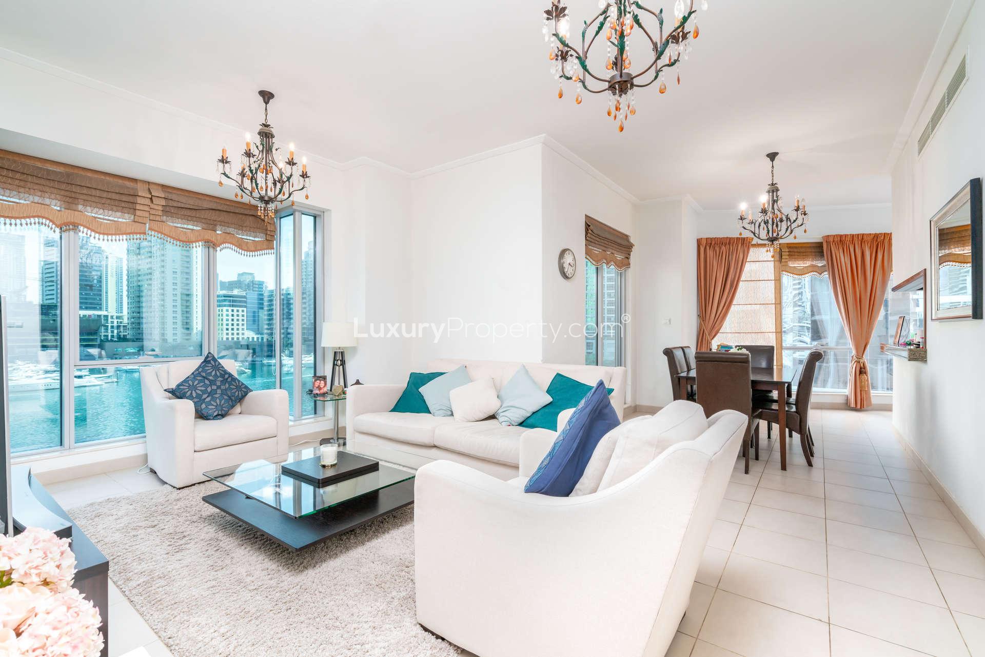 Bright bedroom in Dubai Marina apartment with en-suite bathroom and walk-in closet