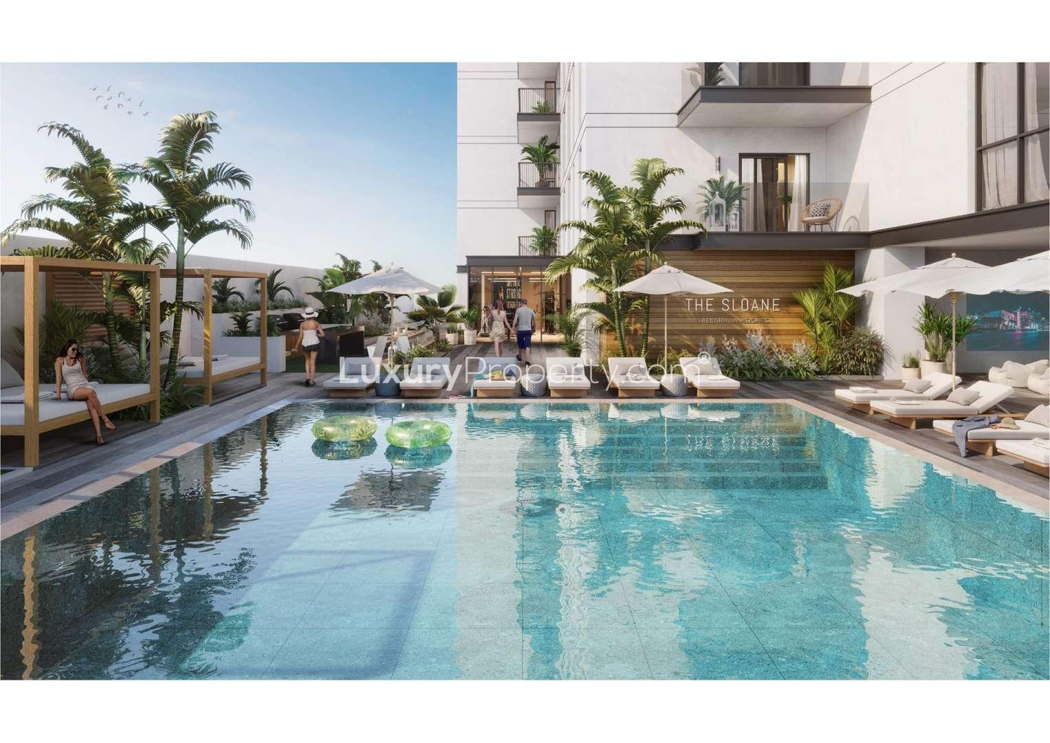 Rooftop garden with yoga mats at The Sloane, Jumeirah Village Circle apartment