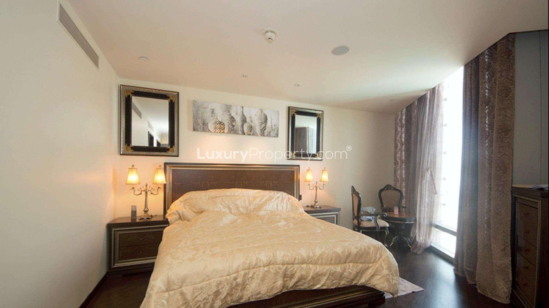 "Stunning view of Burj Khalifa, Downtown Dubai, near full-floor studio apartment for sale.",Luxurious studio bedroom in Burj Khalifa, Downtown Dubai apartment for sale. Elegant interior design