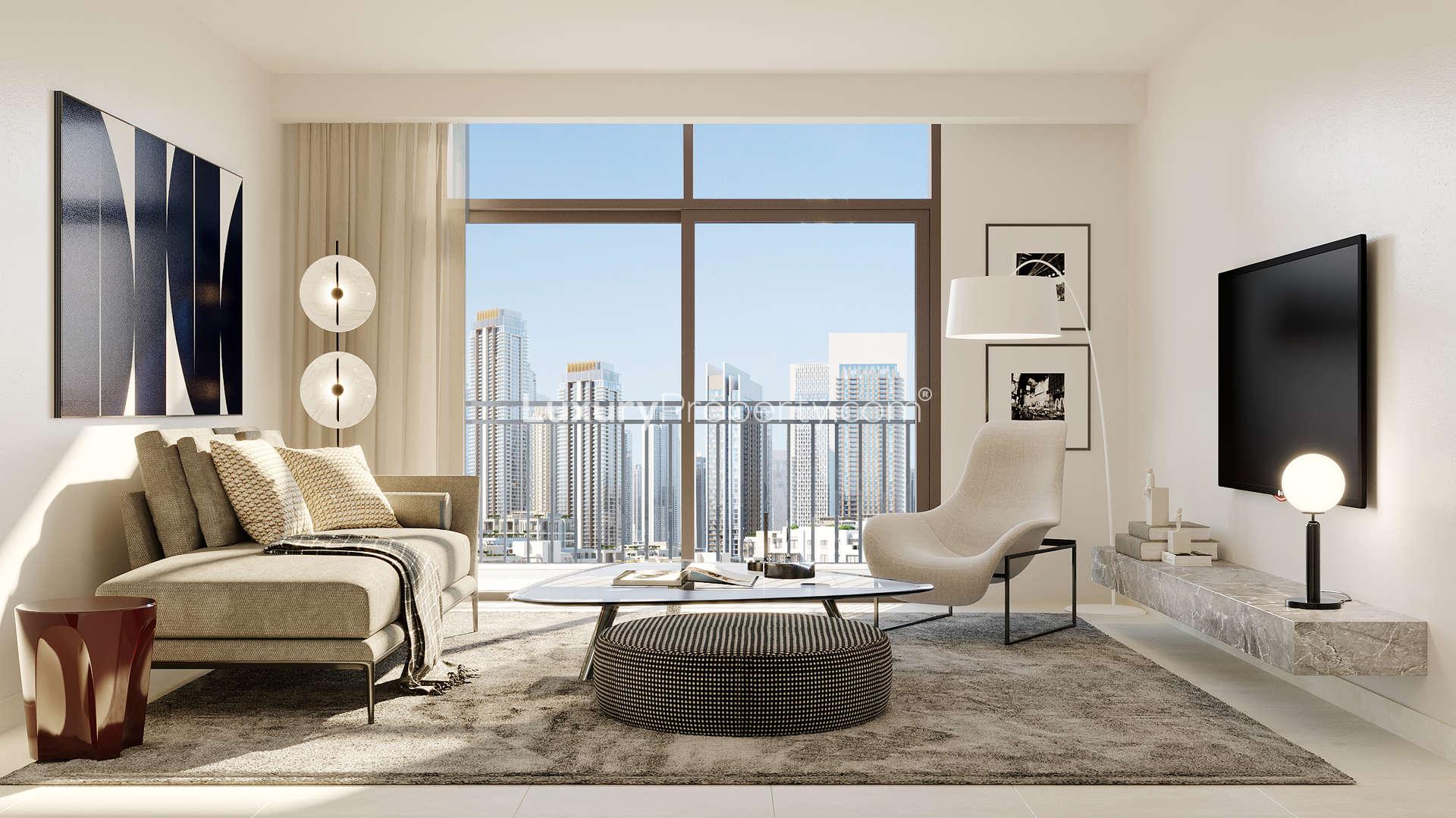 Modern residential towers and lush park at Creek Palace, Dubai Creek Harbour