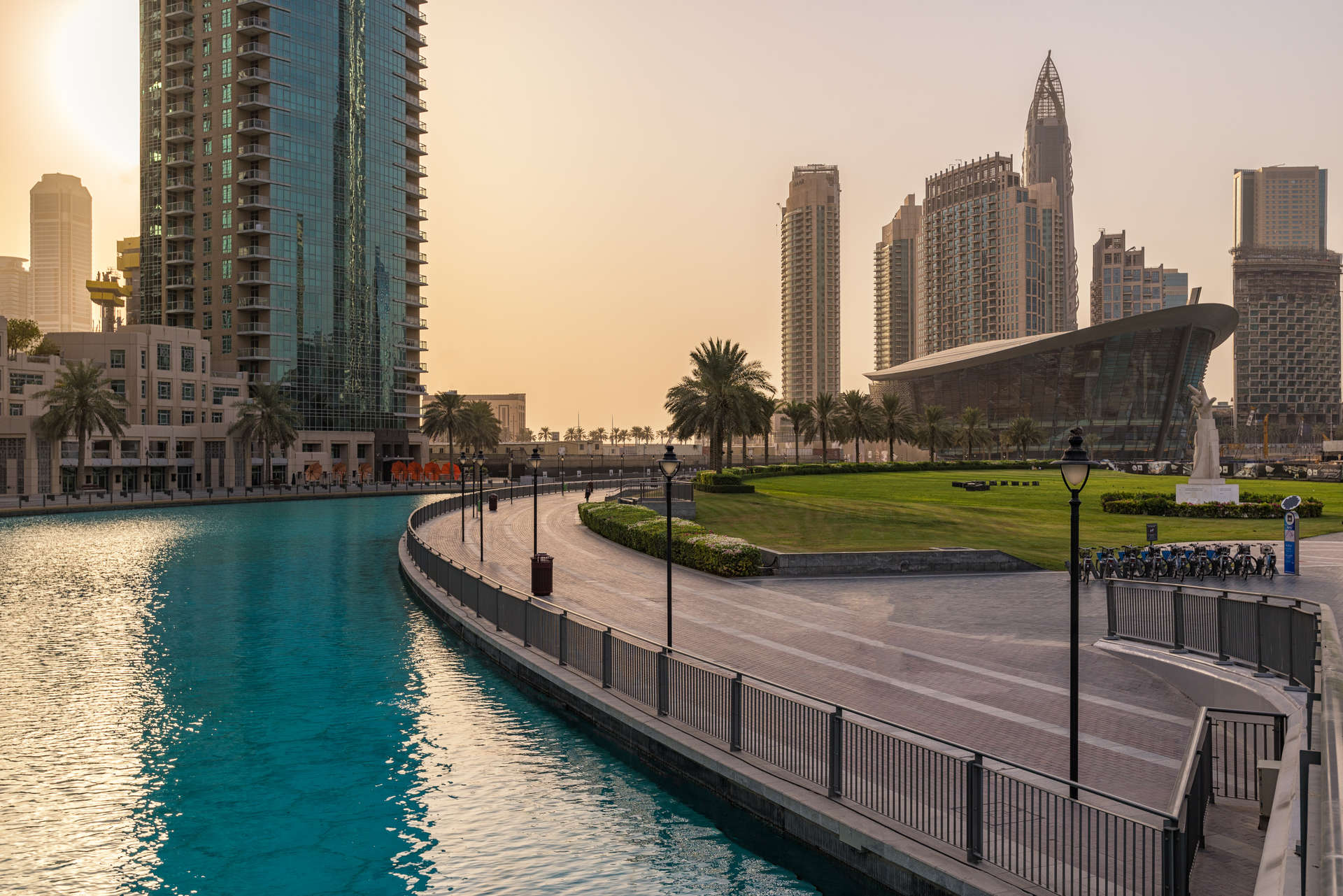 Night view of Grande At The Opera District, Downtown Dubai, with city skyline