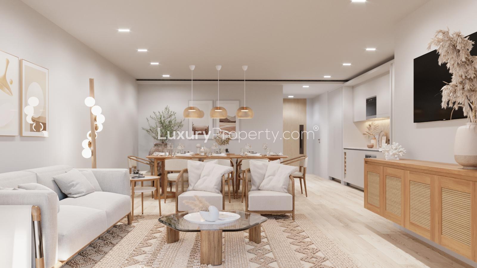 Modern living room in Marylebone Square apartment, featuring elegant decor and balcony view