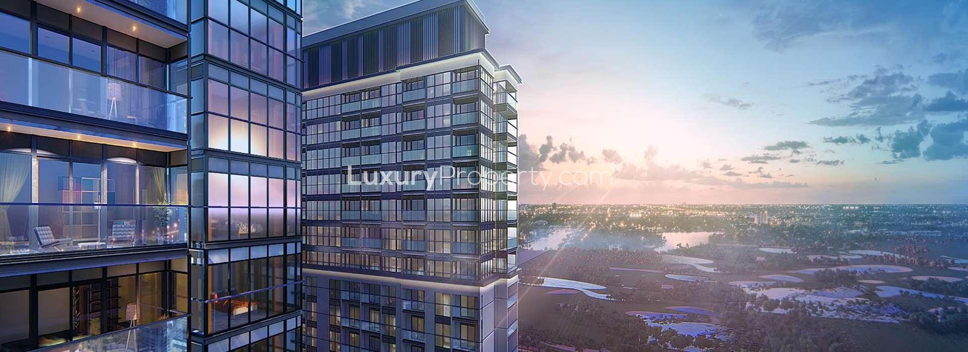 Studio apartment bedroom with modern decor, large window view in Sobha Hartland, Dubai