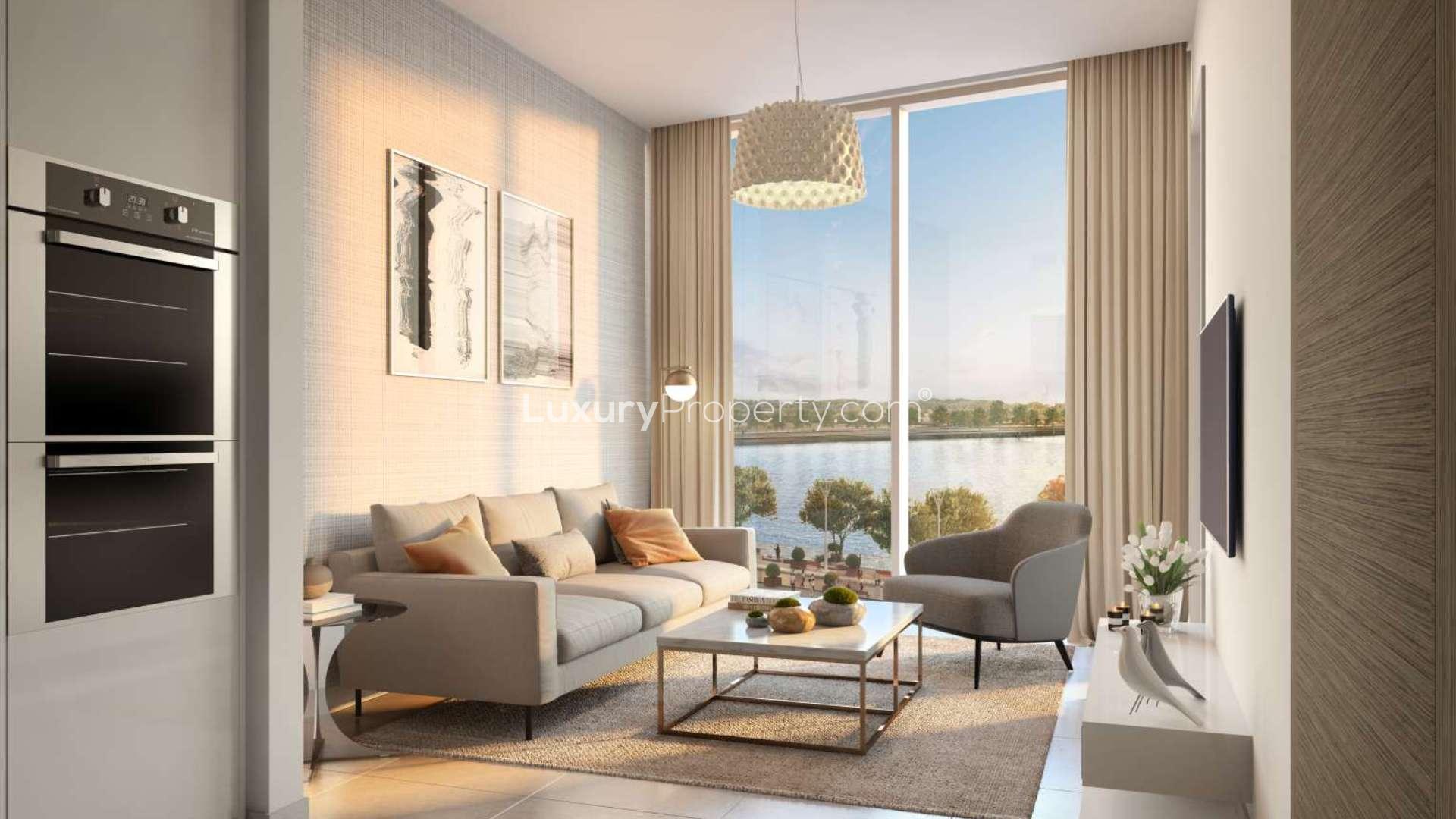 Studio apartment interior at Waves Grande, Sobha Hartland, with large window and modern decor