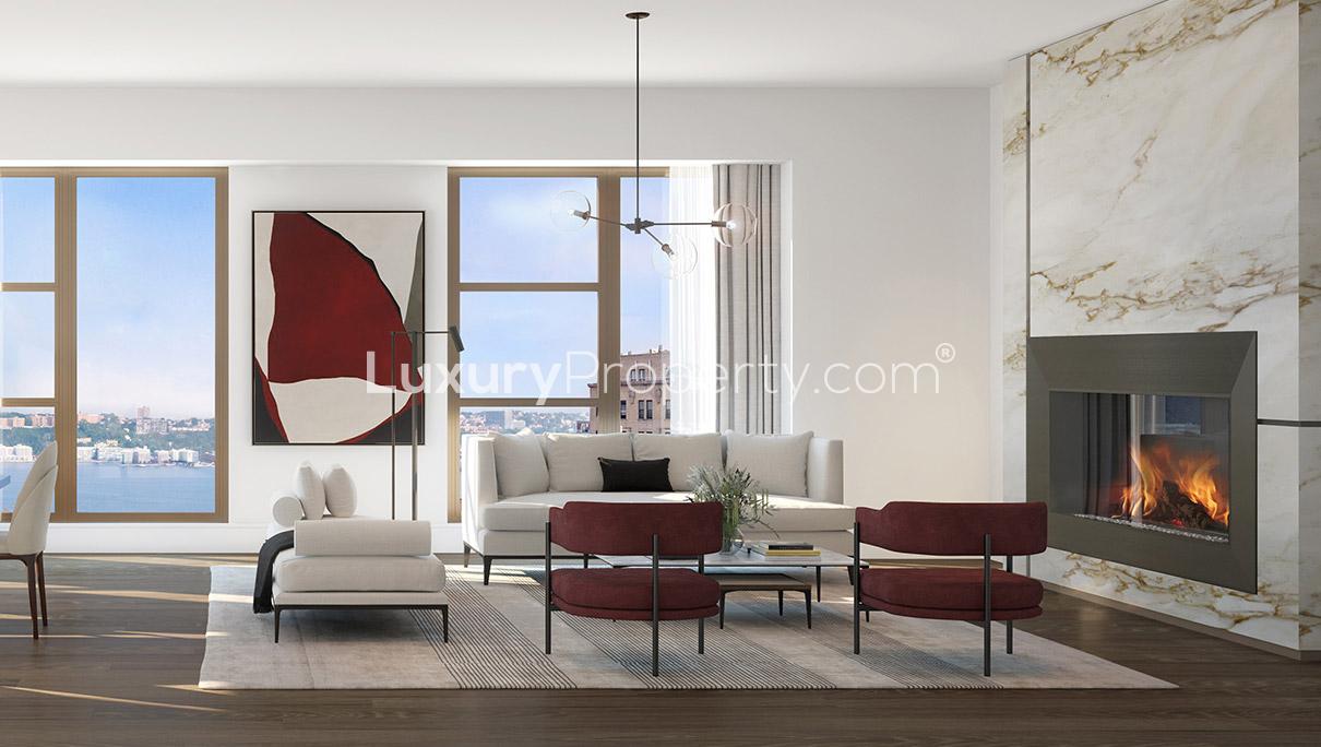 Elegant living-dining area in Manhattan condominium, featuring modern decor and city views