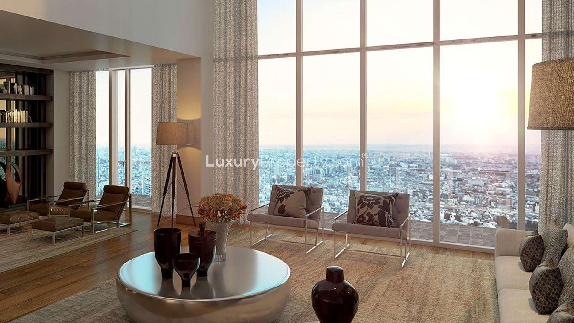 Luxurious living room in Trump Towers apartment, Delhi NCR, with cityscape views at sunset