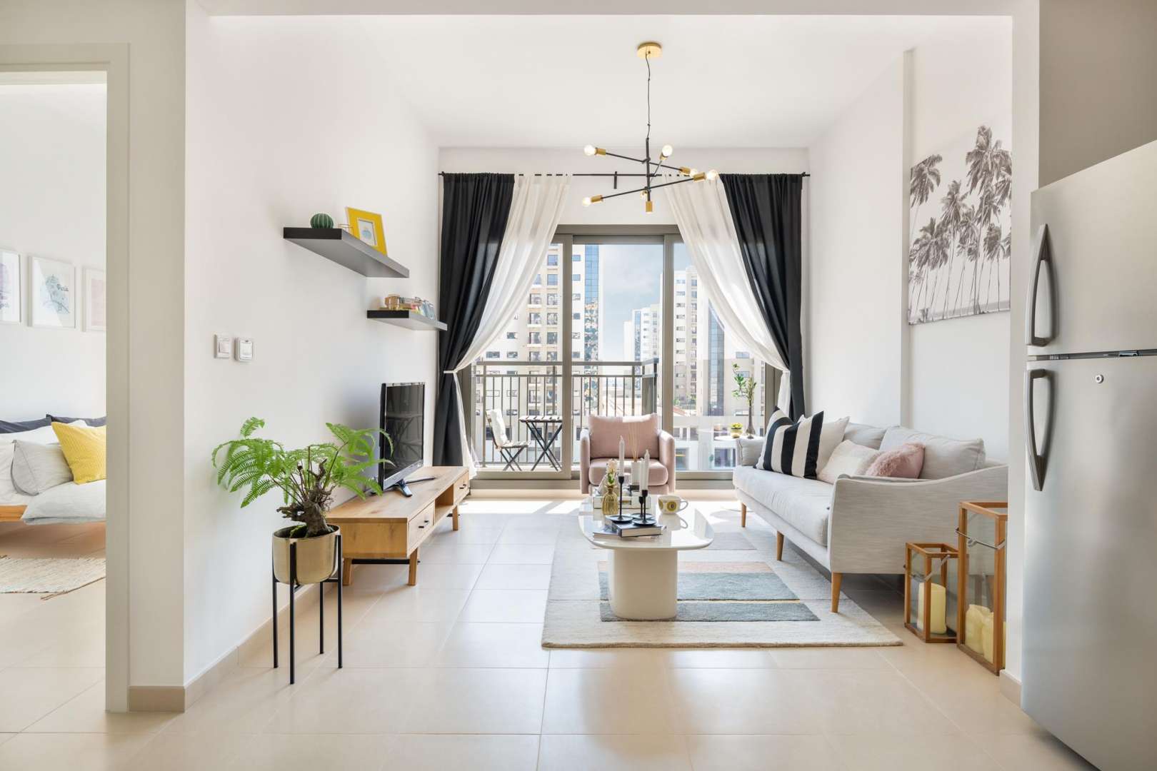 Stylish, modern living room in UNA, Dubai Town Square apartment for sale, bright decor