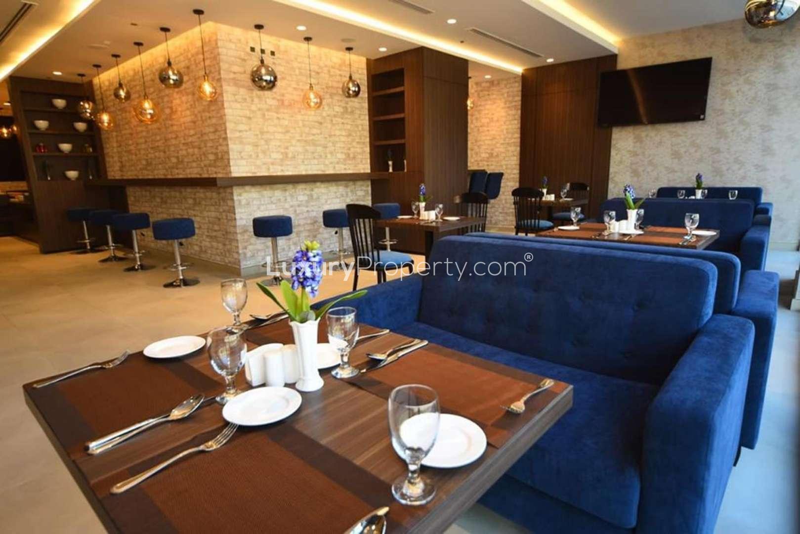Modern dining area in three-star hotel investment property near Dubai for sale