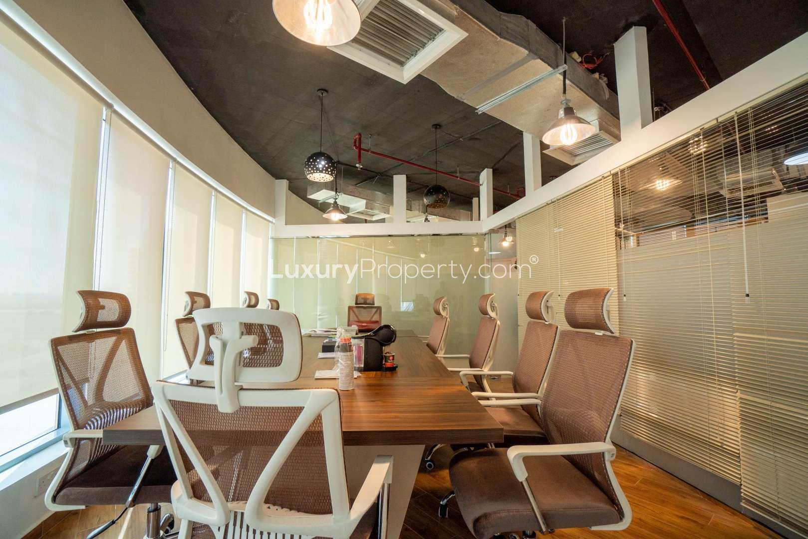 Office space in XL Tower, Business Bay, featuring modern furniture and ample storage