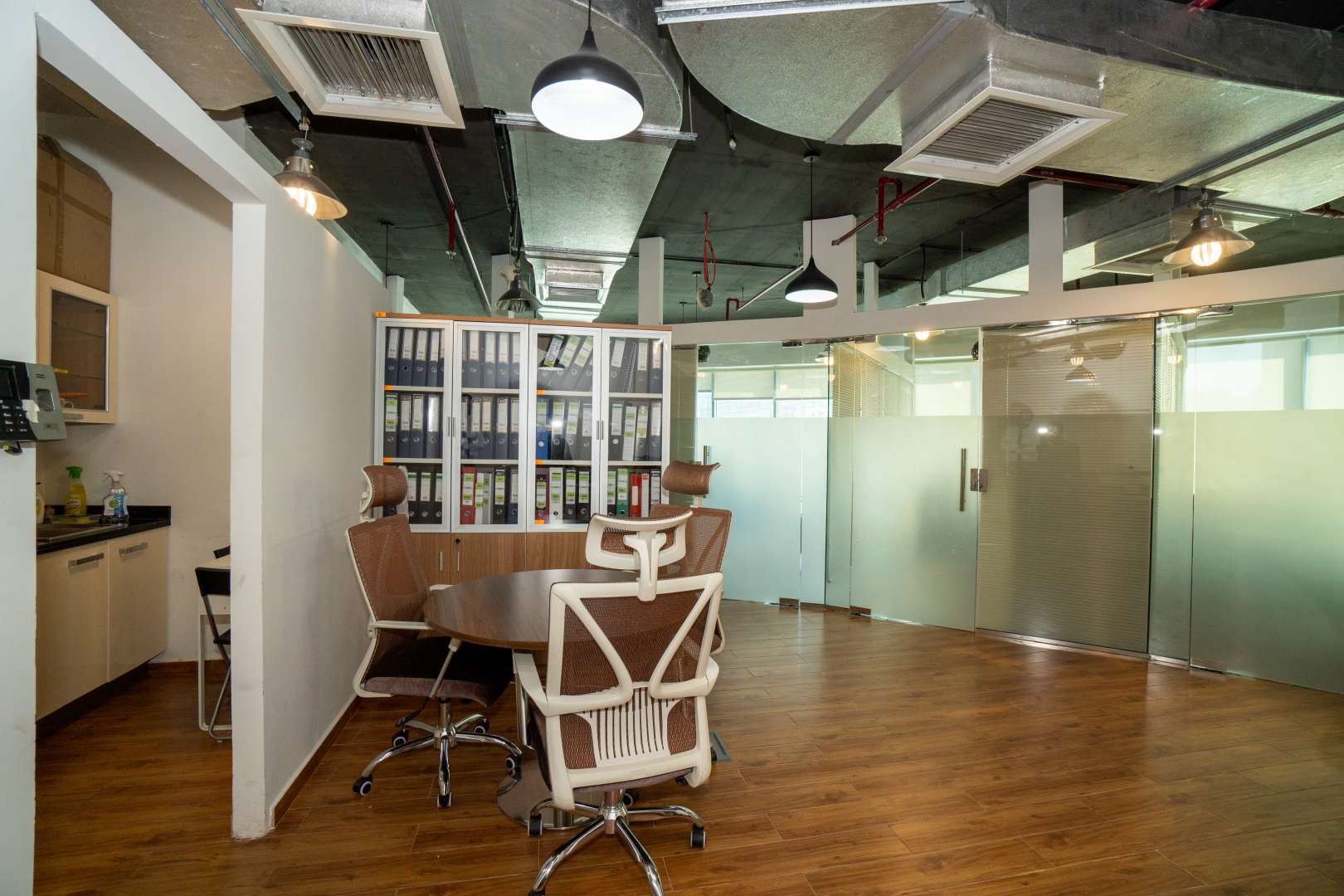 Modern office space in XL Tower, Business Bay, featuring conference table and ergonomic chairs