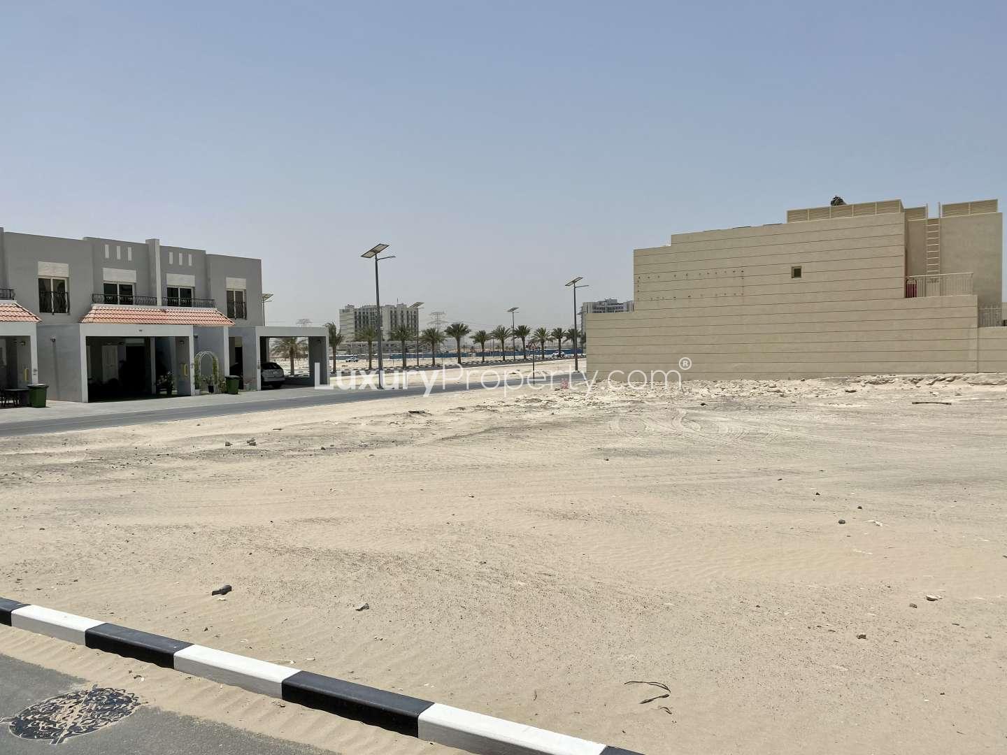 Freehold corner plot for sale in Al Furjan West Village, Dubai, empty land view