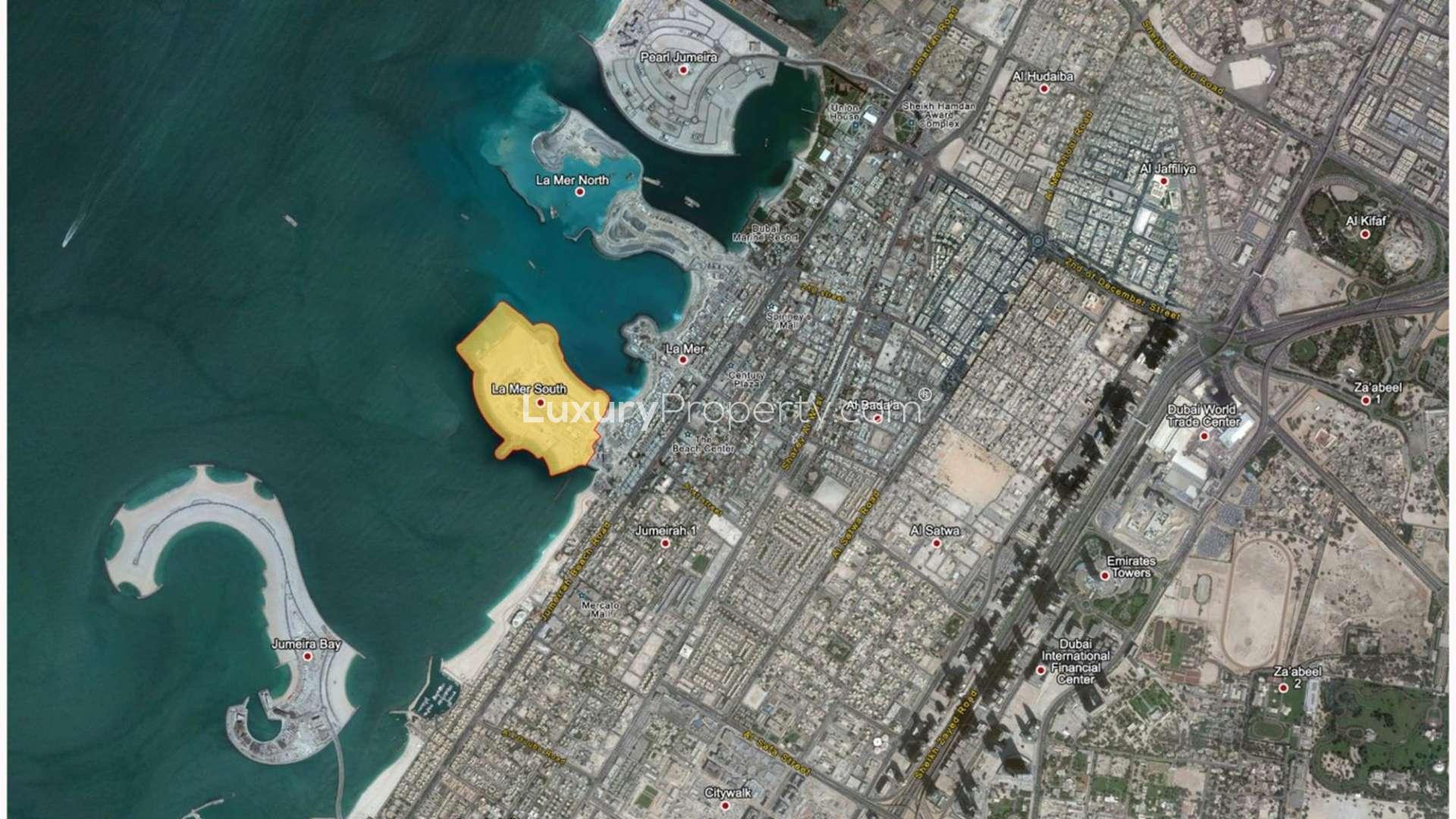 Colorful beach huts in La Mer Maisons, Jumeirah, near exclusive residential corner plot for sale