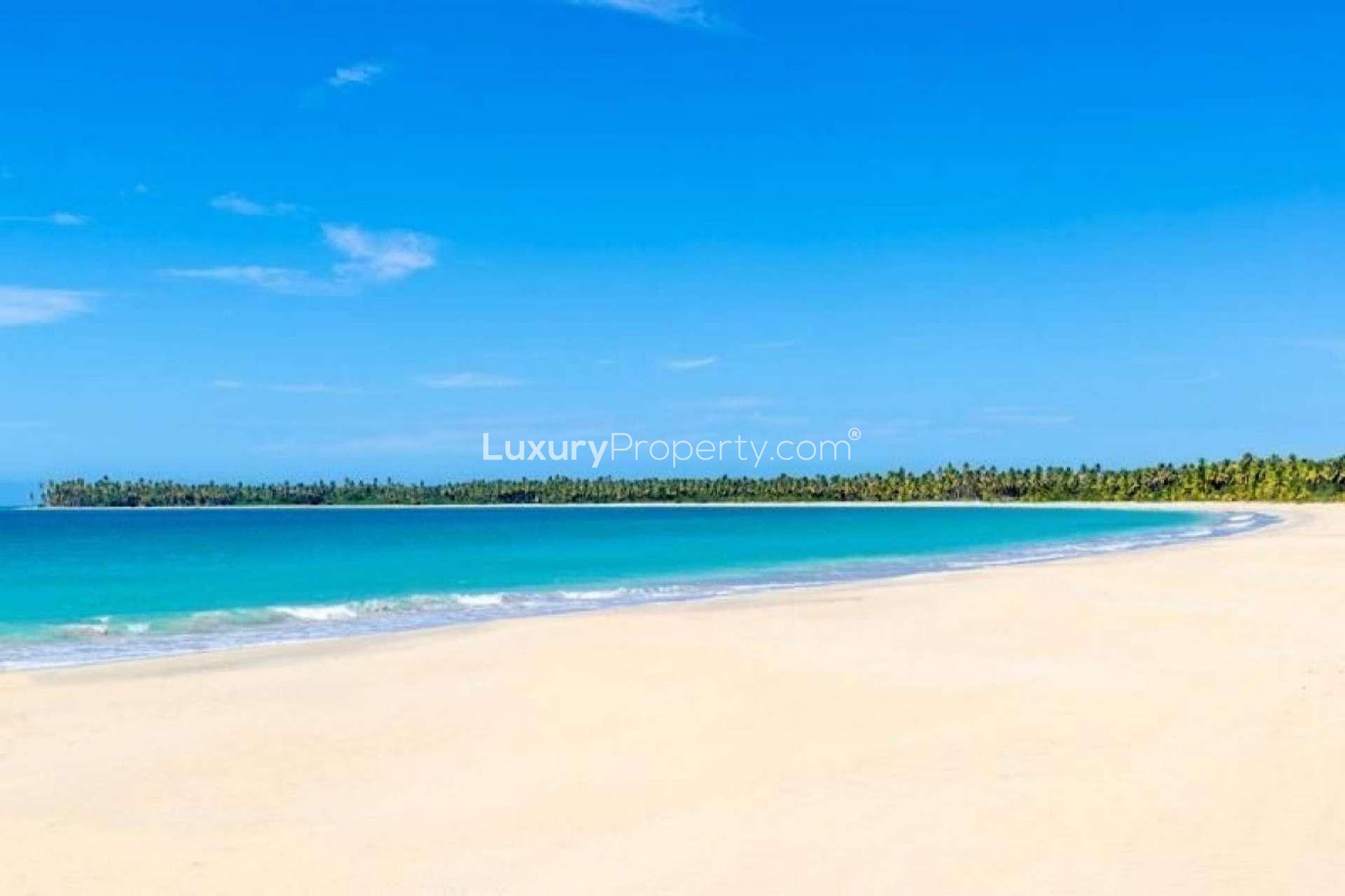 Tropical beachfront land for sale in Playa Costa Esmeralda, Miches, Caribbean resort potential