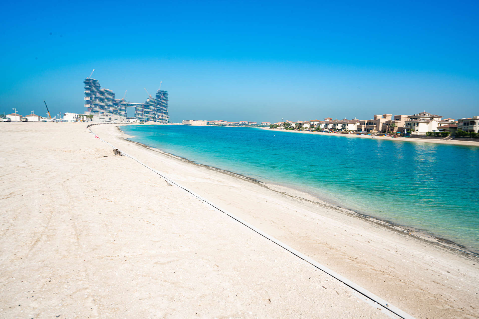 Beachfront plot for sale on Palm Jumeirah, offering stunning views of clear blue waters