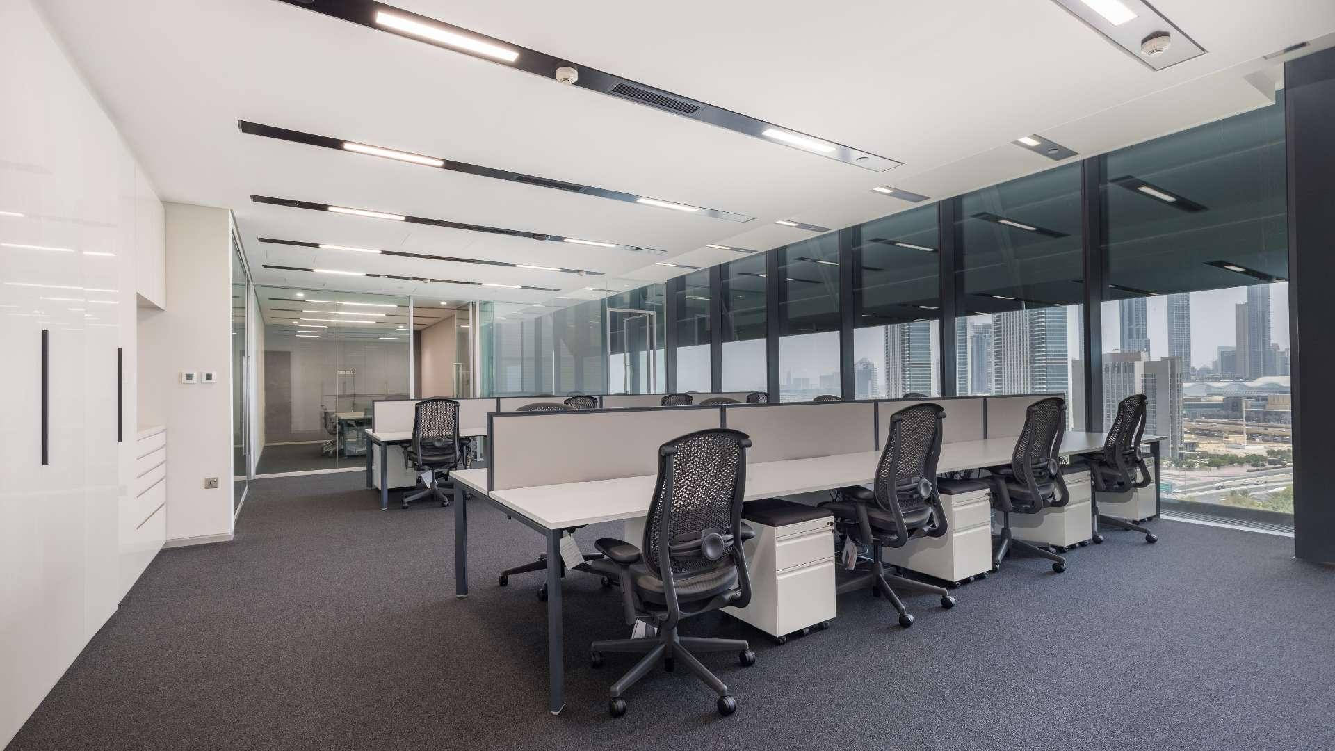 Modern furnished office space in DIFC's Index Tower with sleek design and ample lighting