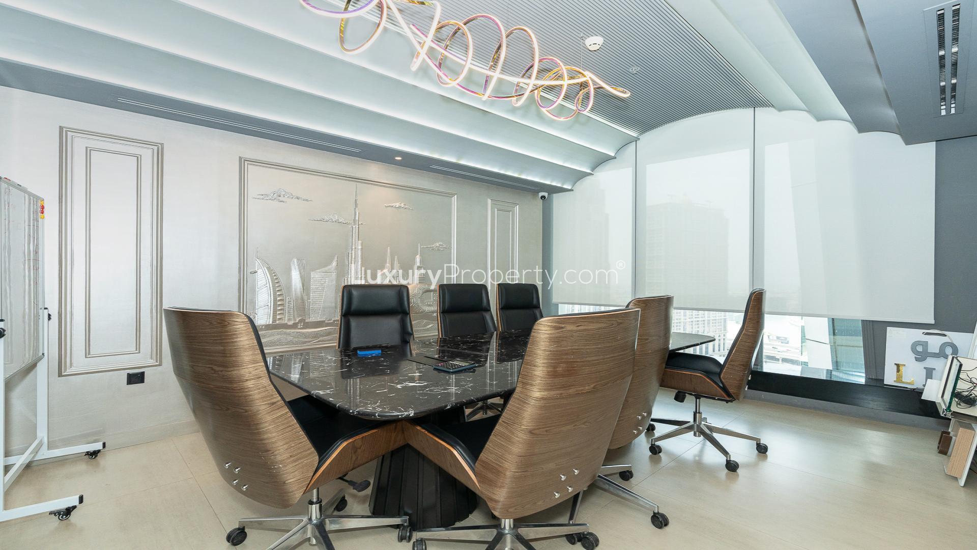 Modern office interior in Al Manara Tower, Business Bay, featuring sleek desk and decor