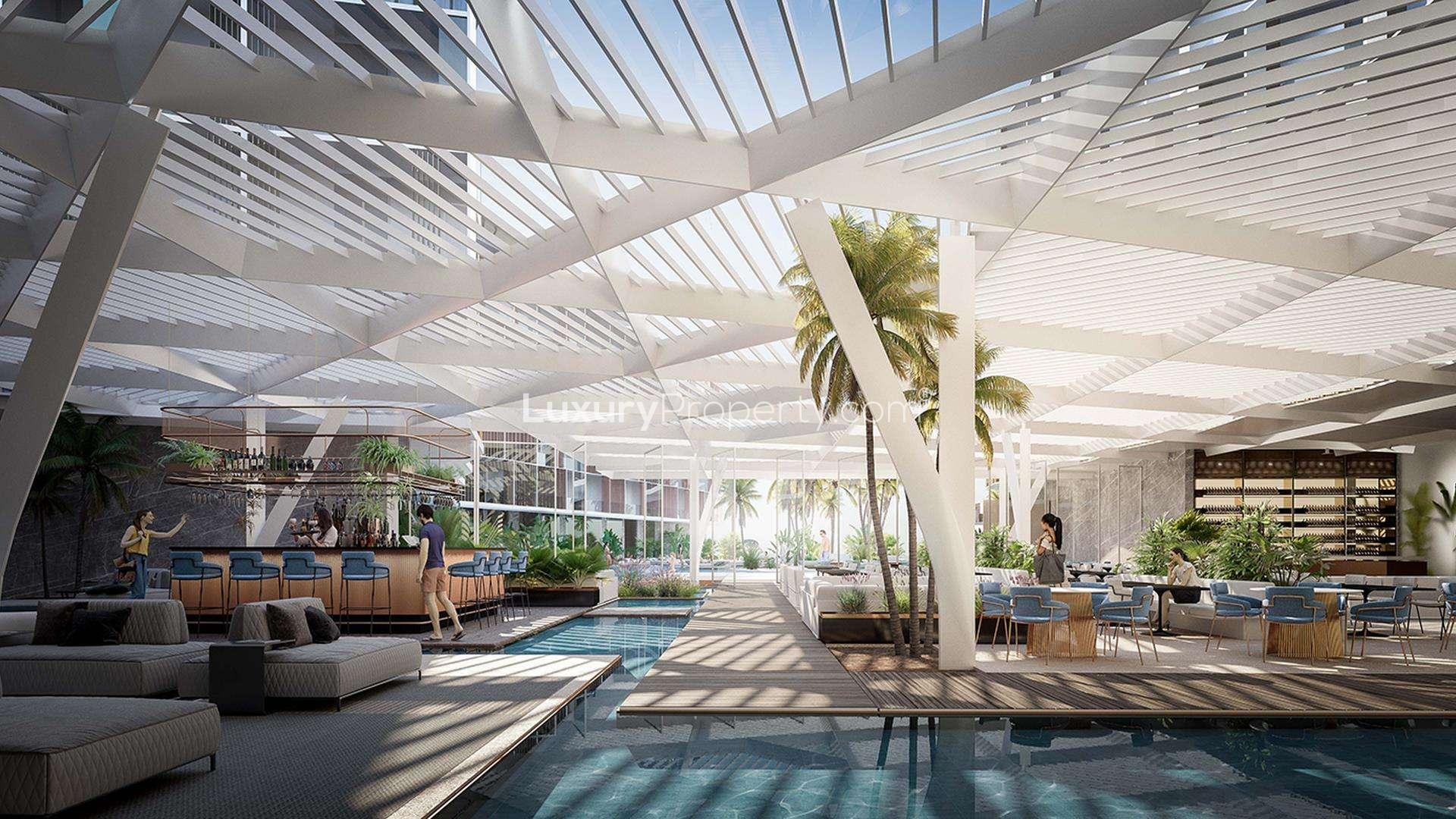 Luxury poolside lounge at Cote d'Azur Hotel, The World Islands, Dubai skyline view