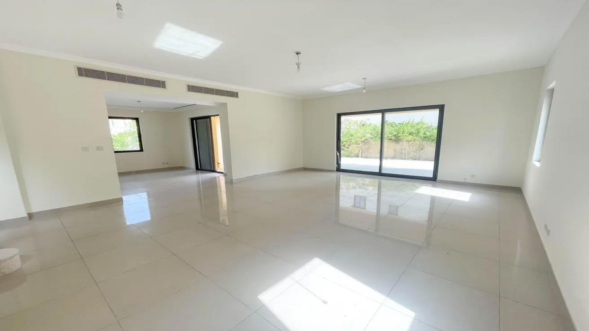 Exterior view of spacious 4-bedroom townhouse with garden in Samara, Arabian Ranches 2