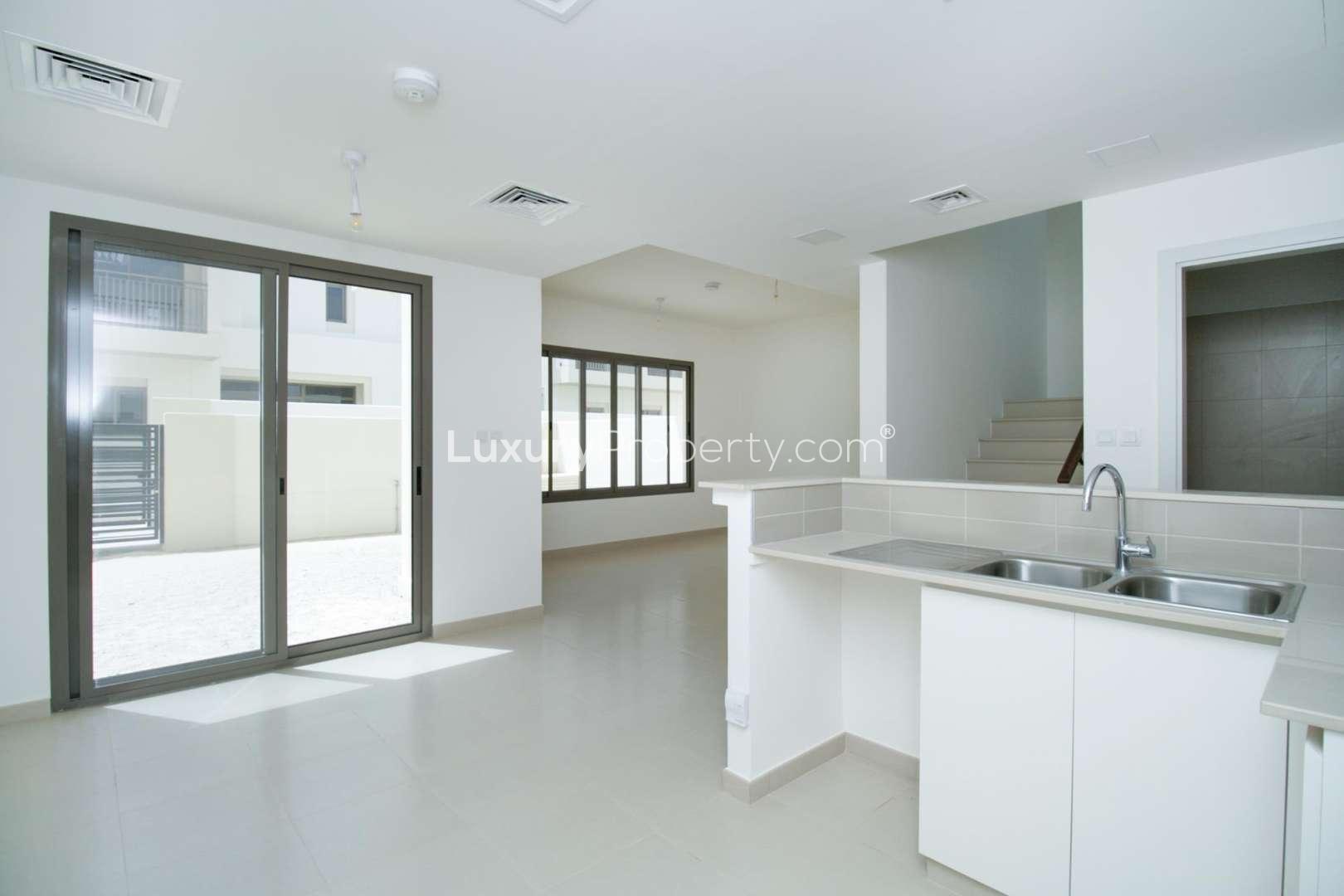 Modern kitchen in 3-bedroom townhouse for rent, Naseem, Town Square, Dubai