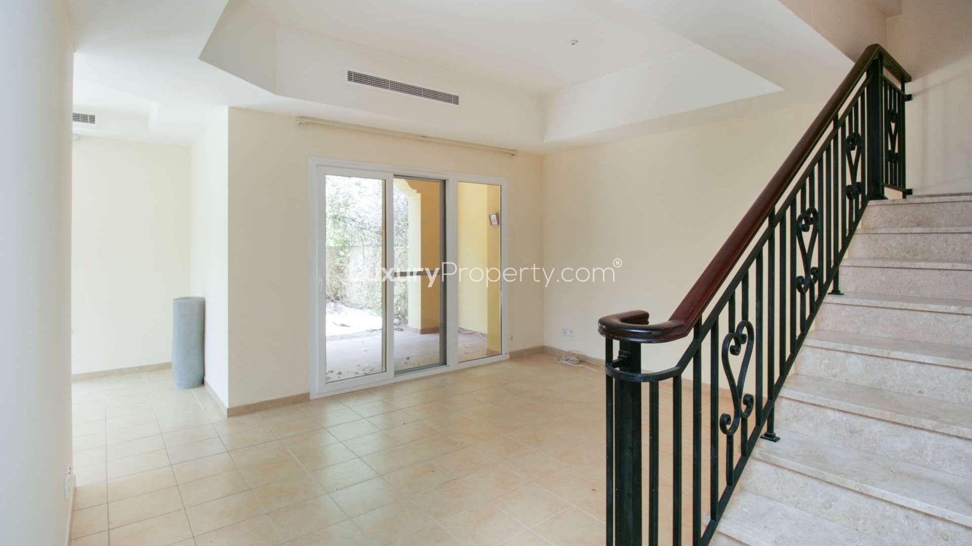 Spacious living area with staircase in Palmera 2 townhouse, Arabian Ranches for rent