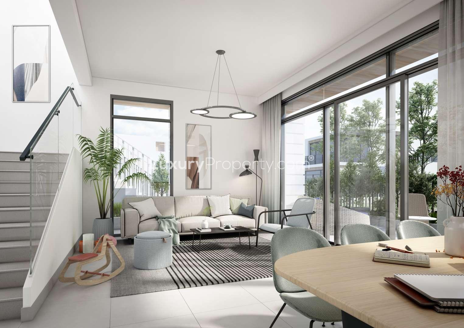 Modern kitchen and dining area in 4-bedroom triplex townhouse, Bliss, Arabian Ranches III