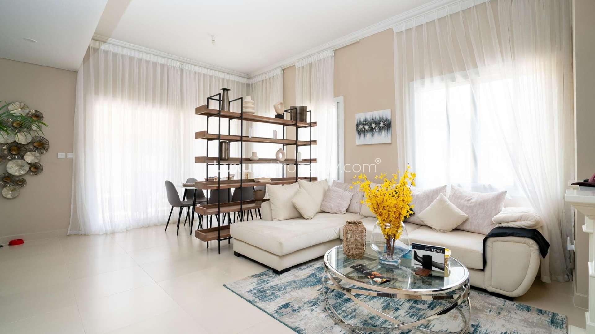 Cozy living room in upgraded 3-bedroom townhouse, Casa Dora, Serena. Modern decor and fireplace
