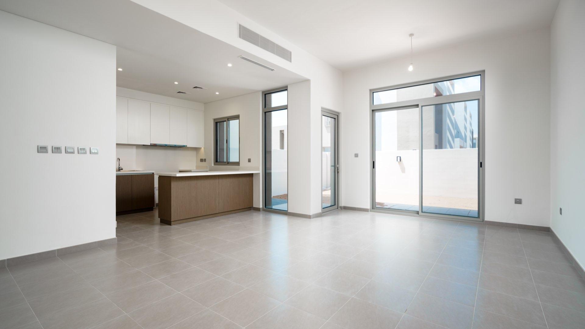 Modern 3-bedroom townhouse exterior in Reem Community, Arabian Ranches 2, for sale