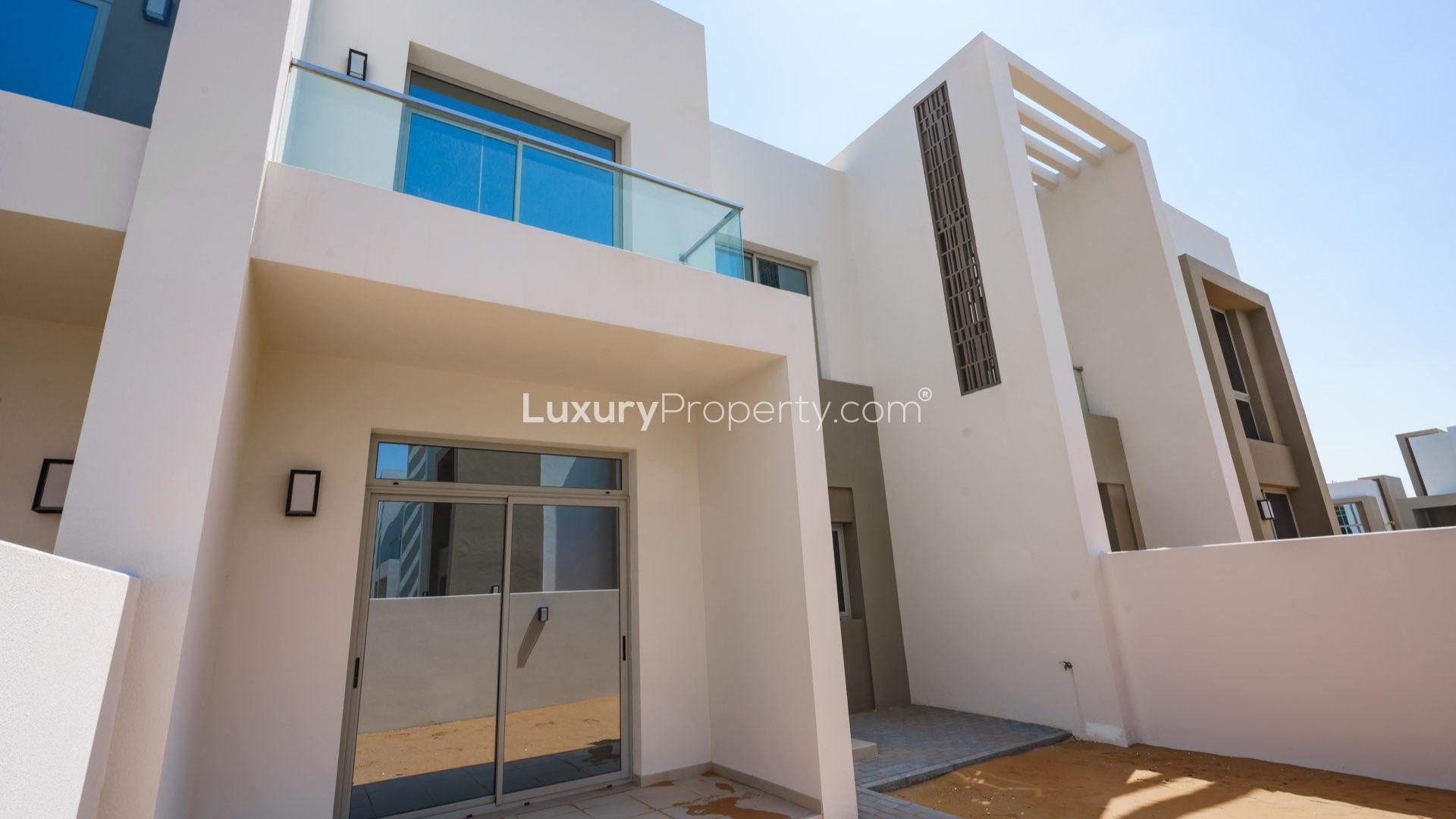 Open-plan kitchen and living area in Reem Community townhouse, Arabian Ranches 2 for sale