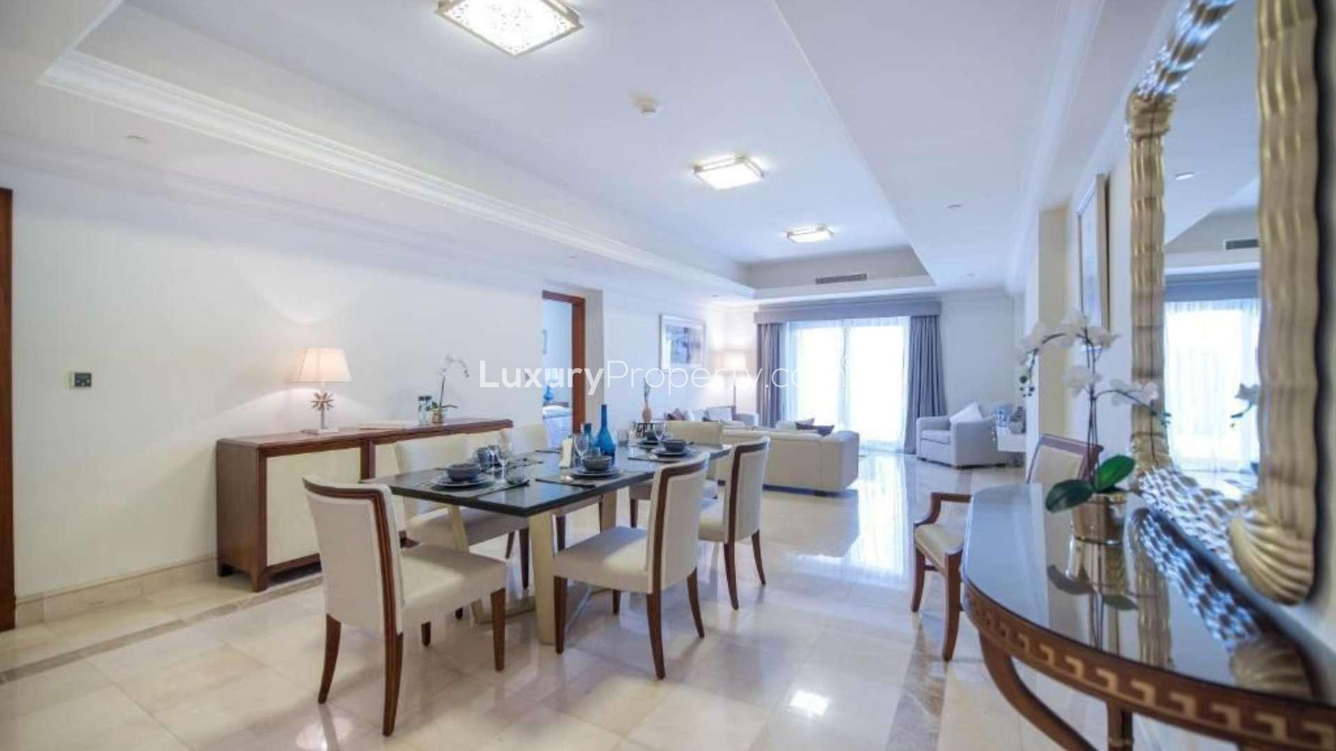 Dining area in 3-bed townhouse, Fairmont Residence, Palm Jumeirah, elegant decor and seating