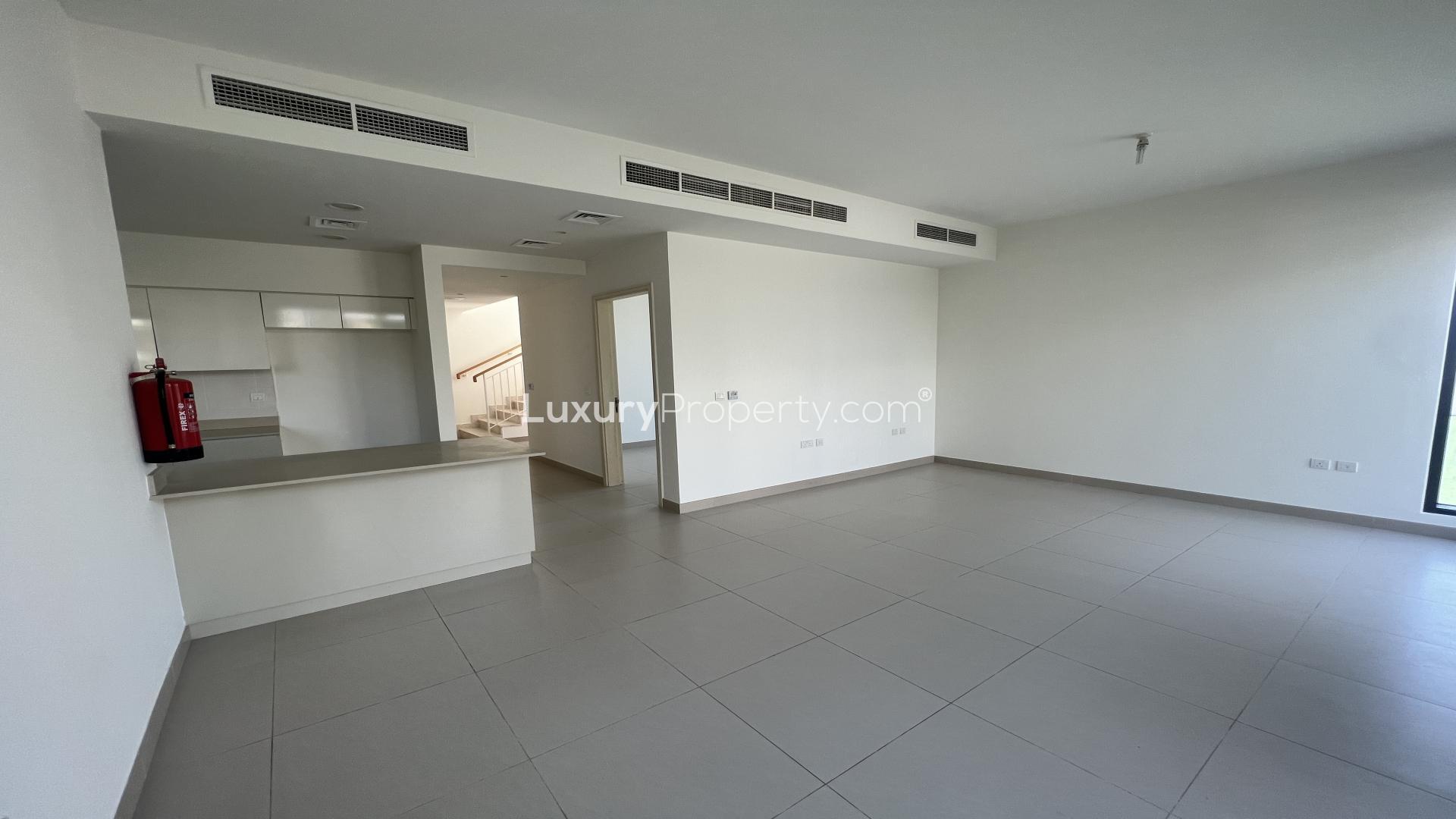 Corner villa in Maple 2, Dubai Hills Estate with green lawn and modern design