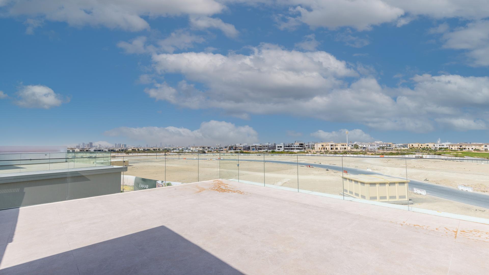 Spacious living room with large windows, brand new villa in Dubai Hills Estate