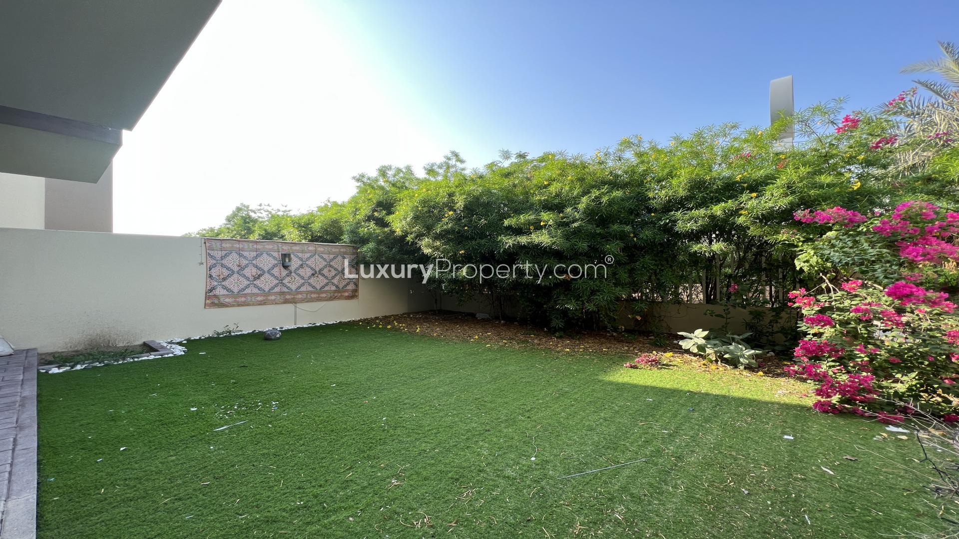 "Spacious living area in Maple 3-bedroom villa, Dubai Hills Estate, with garden view.","Spacious garden in 3-bedroom villa, Maple at Dubai Hills Estate, lush greenery, and privacy.",Spacious living area in 3-bedroom townhouse, Maple at Dubai Hills Estate, for rent