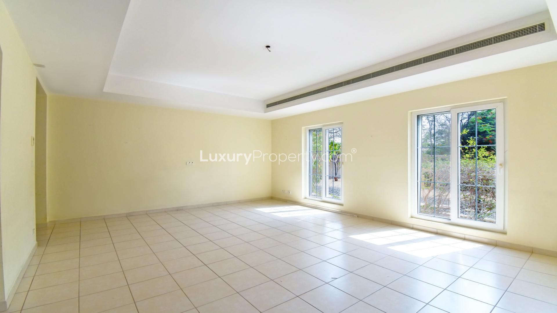 Spacious living room with large windows in Mirador La Coleccion, Arabian Ranches villa for rent