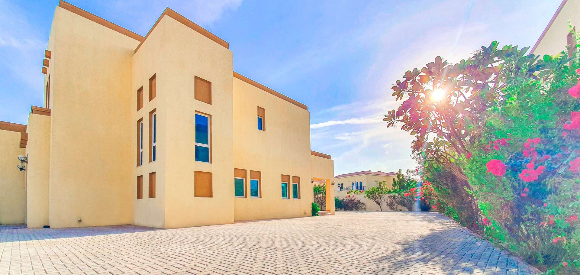 Empty living room with large windows in Jumeirah Park regional villa, Dubai