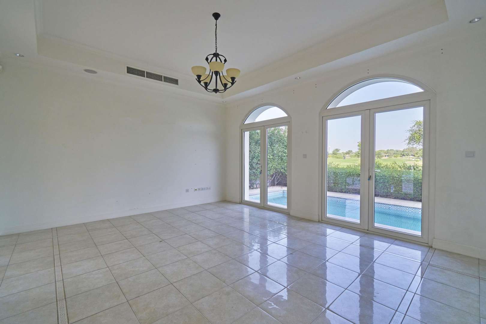 Bright living area with pool view in luxury villa, Sienna Lakes, Jumeirah Golf Estates