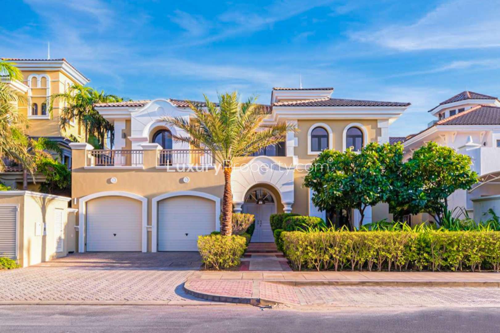 Luxurious living room in Palm Jumeirah garden villa with sea view and elegant decor
