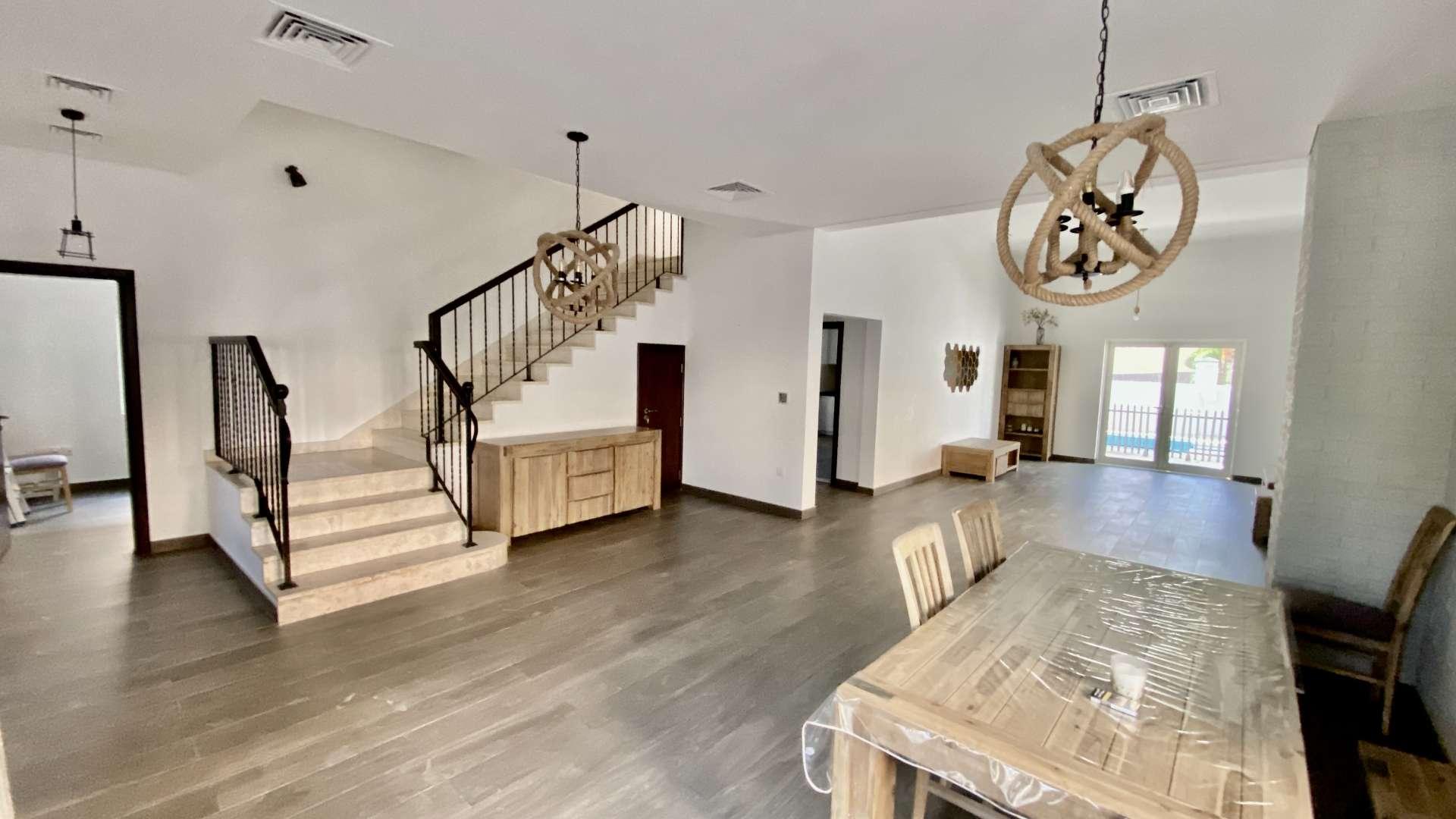 Interior view of upgraded villa in The Aldea, featuring modern decor and spacious layout