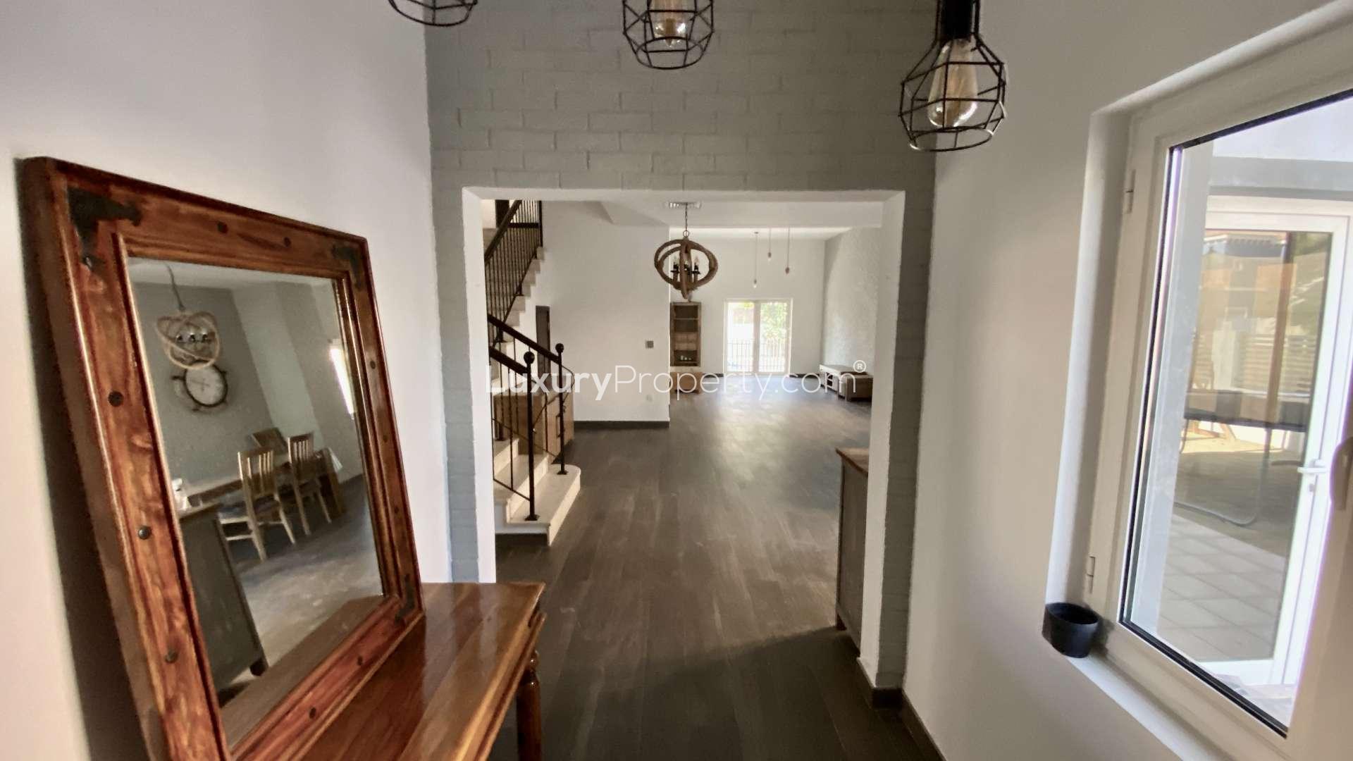 Front view of five-bedroom villa for rent in The Aldea, The Villa community