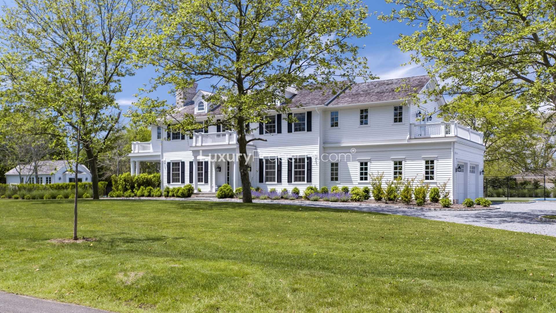 Luxurious Hamptons villa with pool, tennis court, and elegant backyard at 7 Bayfield Lane