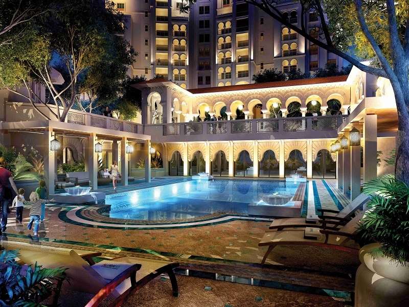 Andalusian-inspired villa exterior with fountain at Jumeirah Golf Estates, Al Andalus community