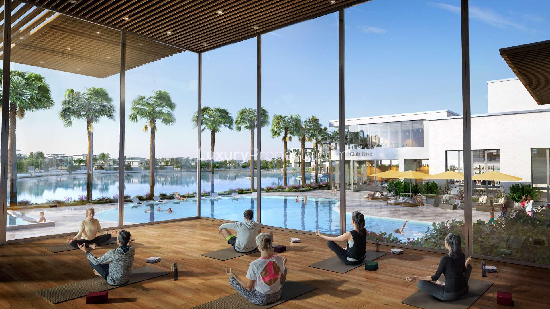 Stunning four-bedroom villa with lush garden in Aura, Tilal Al Ghaf community