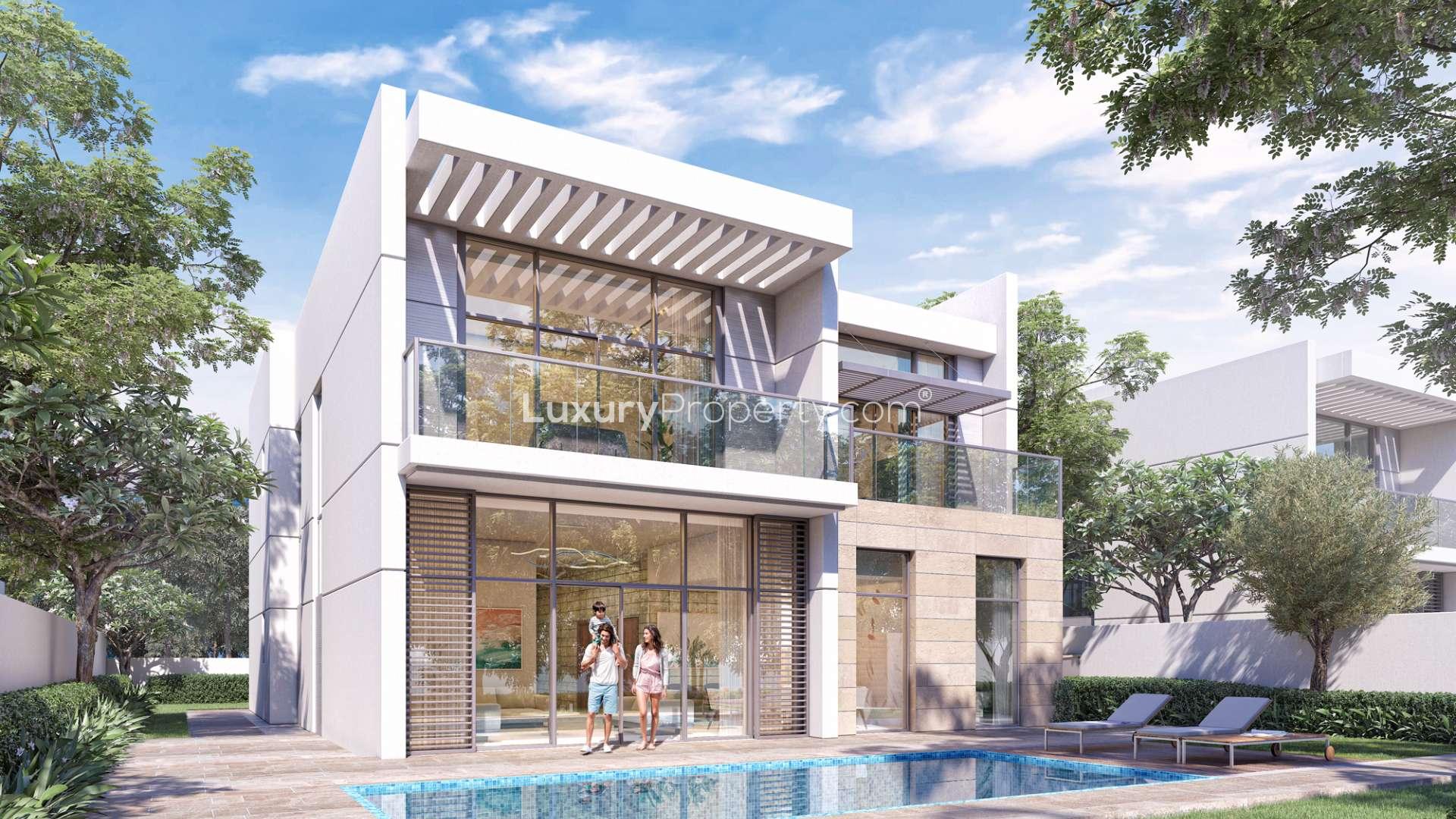 Modern villa exterior at District One, Mohammed Bin Rashid City, surrounded by lush greenery