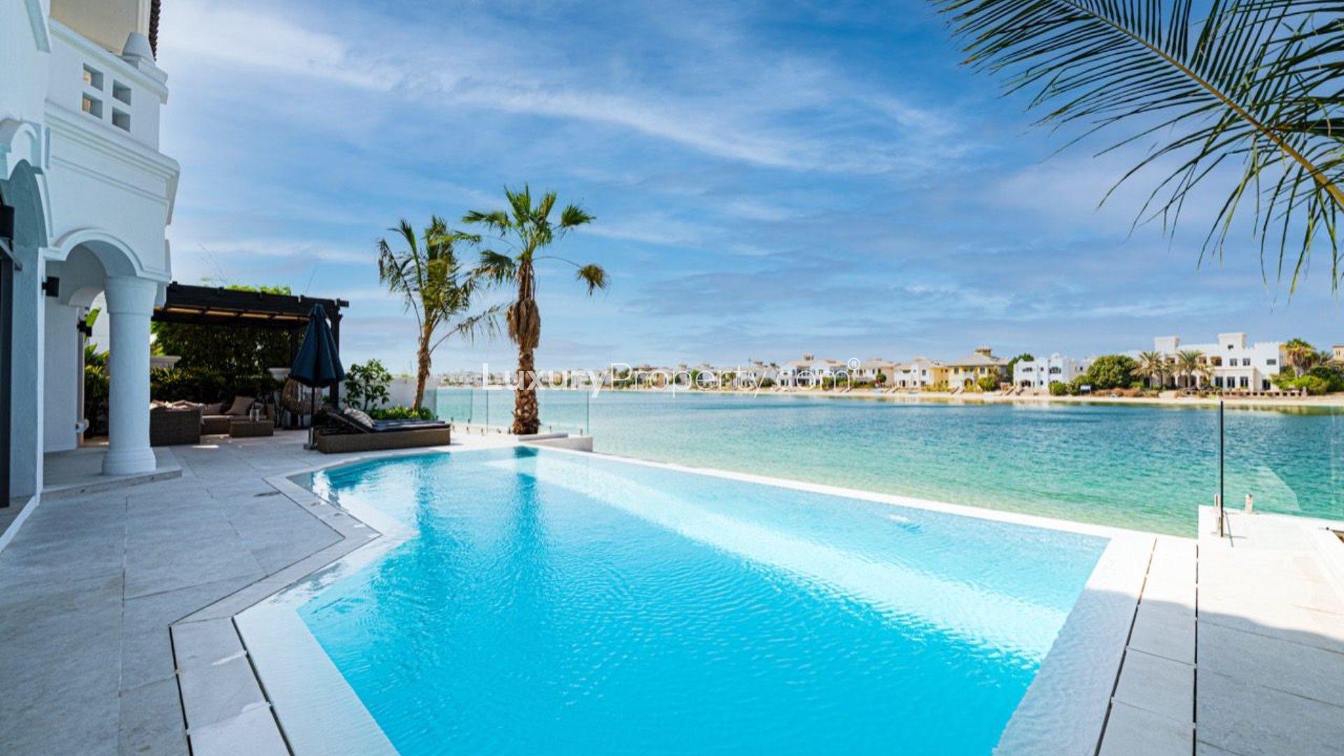 Luxurious living room in fully renovated 5-bedroom villa, Palm Jumeirah, with pool view