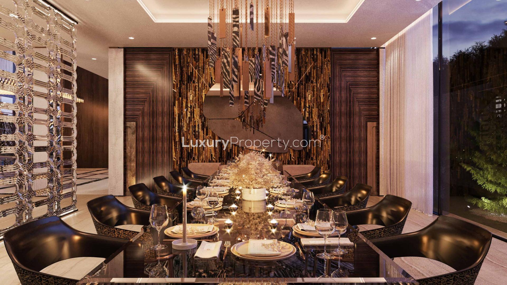 Luxurious living room in seven-bedroom villa, Damac Hills, featuring modern decor and elegant lighting