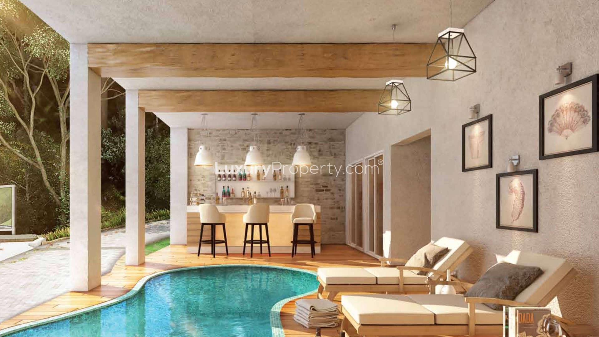 Luxurious living room in Glen Royale villa, Panchgani with fireplace and modern decor